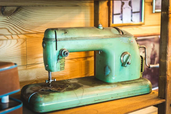 Sewing machine for embroidery and repair of clothes and linen on the table