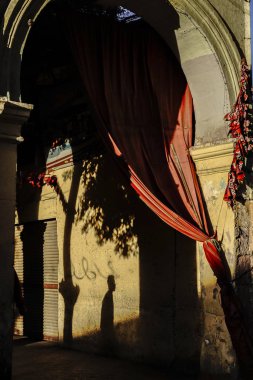 Cairo, Egypt An archway and pedestrians in the busy Khan el-Khalili bazaar.