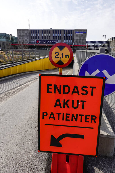 Stockholm, Sweden March 27, 2020 A parking sign in Swedish for the emergency room on the grounds of the Huddinge hospital.