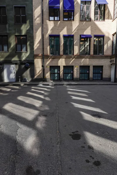 Stockholm, Sweden  A house facade on Oxtorgsgrand and shadows.