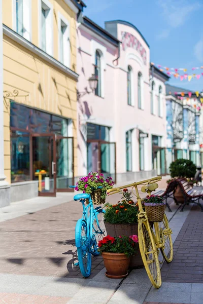 Europe street shops flowers bicycles Sunny day