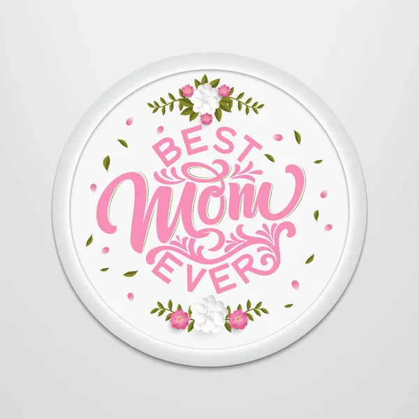 Hand drawn lettering Best Mom Ever in a round frame on the wall. Elegant modern handwritten calligraphy with floral elements and flowers. Mom day. For cards, invitations, prints etc