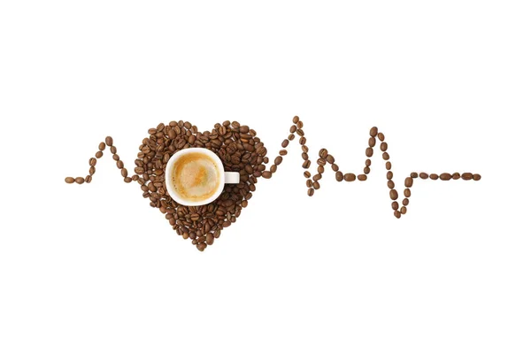 A heart made of coffee beans and a cardiogram, a cup of hot coff — Stock Photo, Image