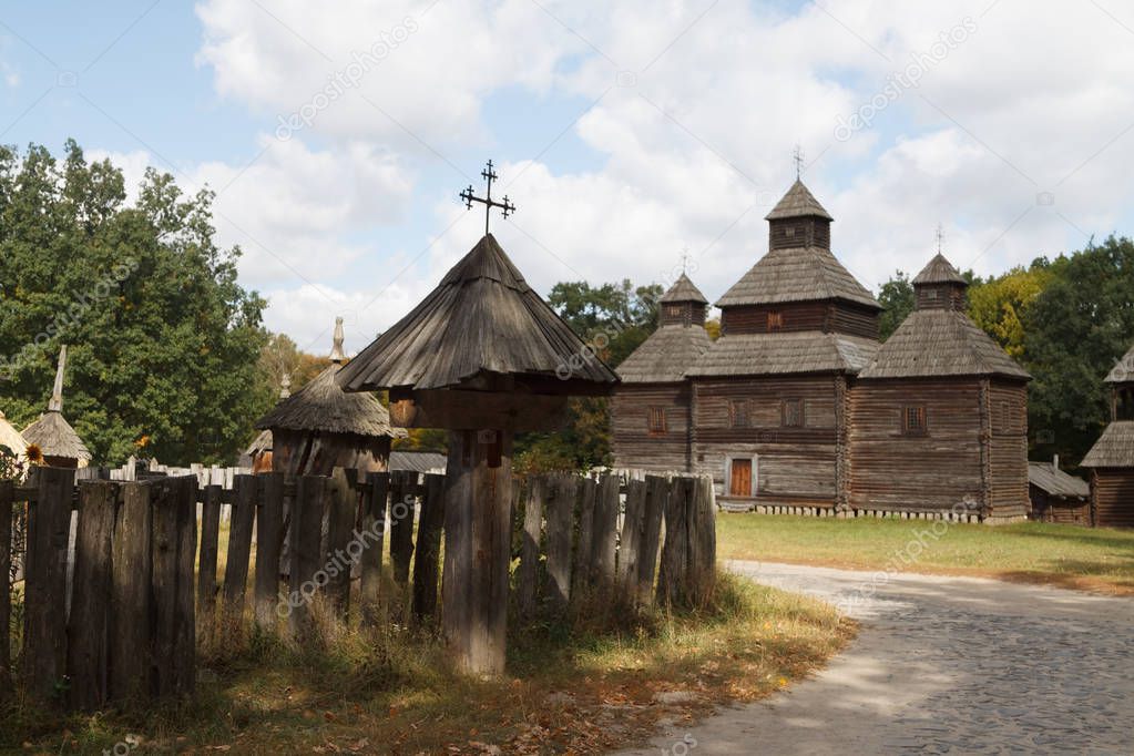 Wooden beehives and wooden church