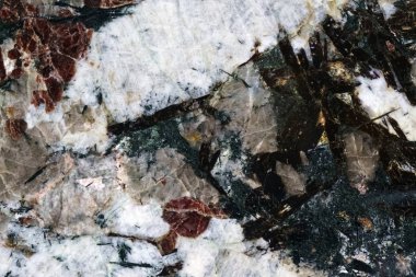 Cilalanmış taşın dokusu.