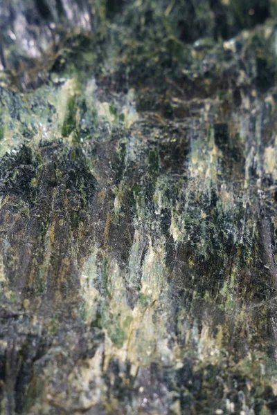 Stone texture with black and green tint — Stock Photo, Image