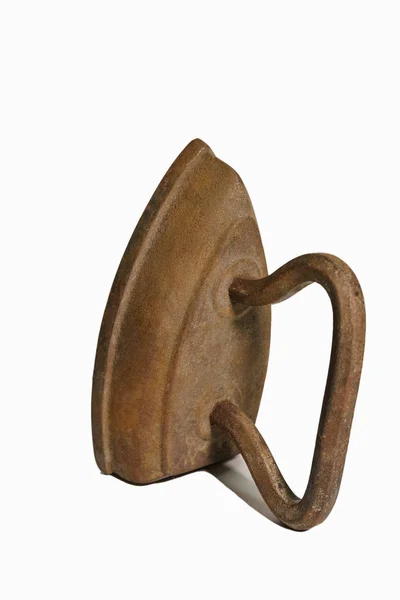 Old, rusty iron for linen. White background. Isolate