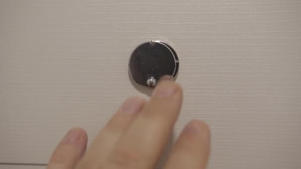 Man Opens Door Peephole Side View — Stock Video