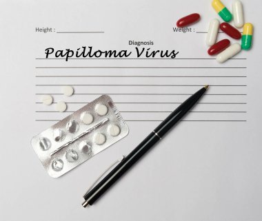 Papilloma virüsü teşhisi beyaz bir kağıda yazılmış. Tıbbi konsept