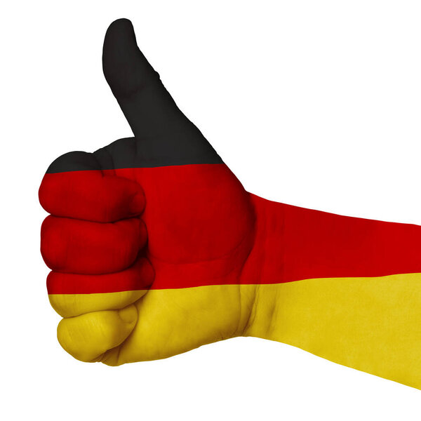 Рука с большим пальцем вверх, флаг Германии раскрашен как символ совершенства, достижения, хорошо - изолирован на белом фоне
