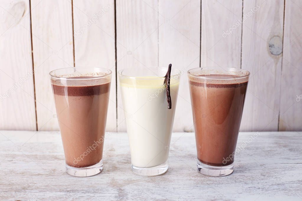 three glasses of milkshakes