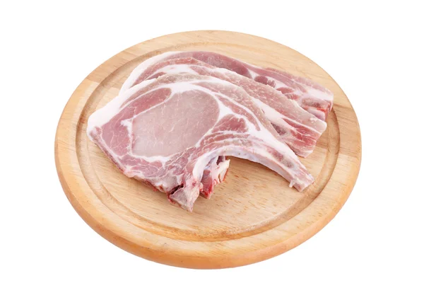 Chuleta de cerdo cruda en madera ancha o chuleta de cerdo cocida stea — Foto de Stock