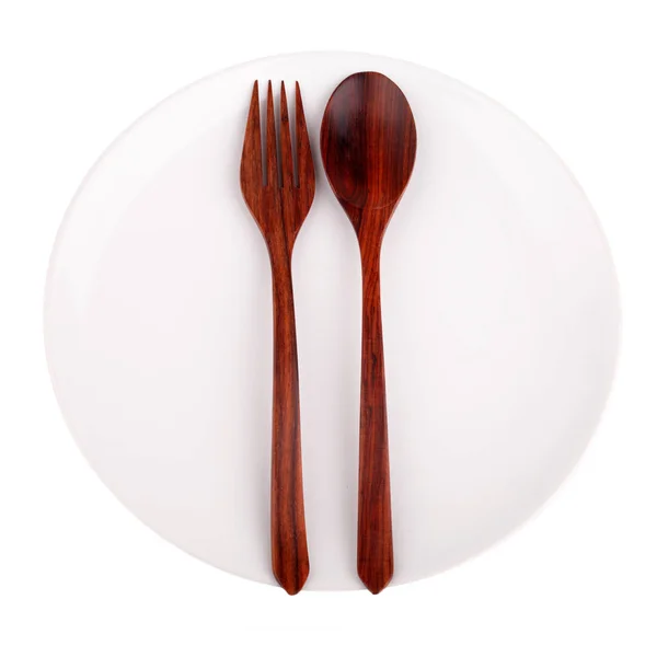 Wood spoon, fork and plate isolated on white backgroun — Stock Photo, Image