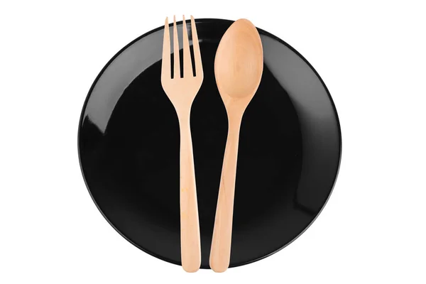 空的黑色瓷质青瓷盘子和勺子叉子 — 图库照片