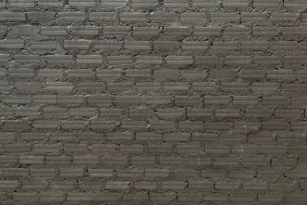 Черный кирпичный фон стены текстуры — стоковое фото