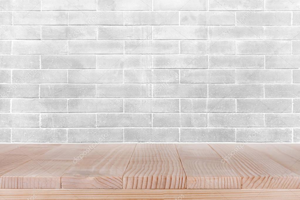 brown wood table top on white concrete wall background -  can be used for display your products 