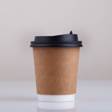 Take-out coffee with cup holder on white background clipart