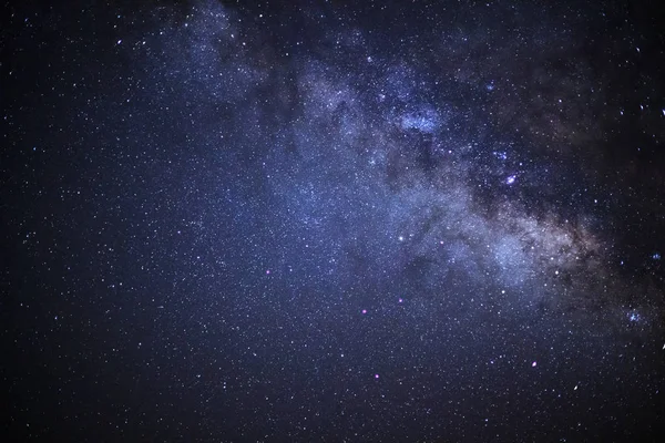 Close-up de Via Láctea galáxia com estrelas e poeira espacial no un — Fotografia de Stock