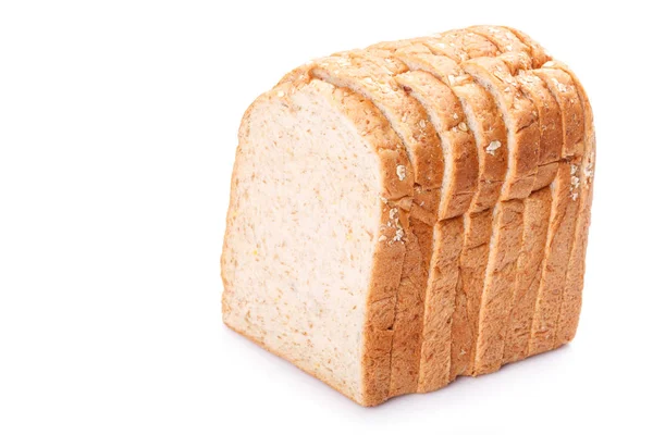 Ломтик цельного пшеничного хлеба на заднем плане — стоковое фото