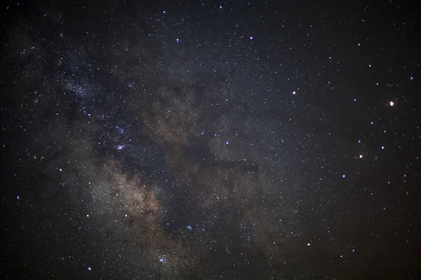 Close up de Via Láctea galáxia com estrelas e poeira espacial no un — Fotografia de Stock