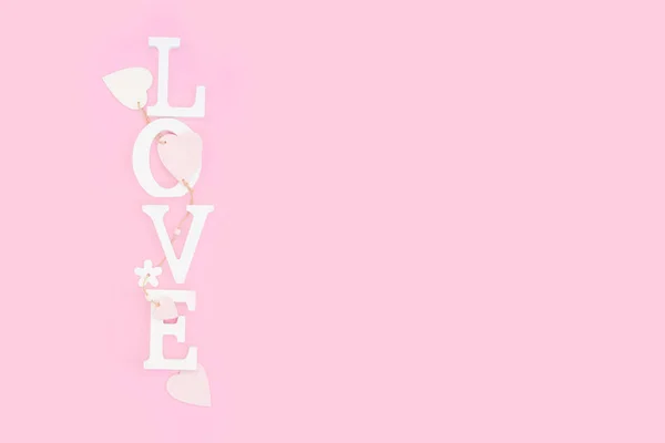 Word love from white volume letters on pink background — Stock Photo, Image