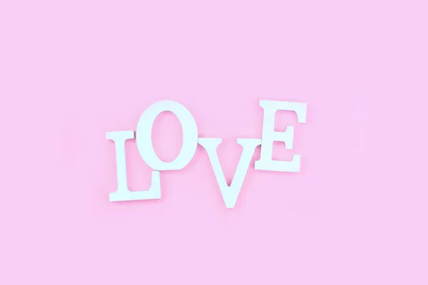 Palavra amor de letras de volume branco no fundo rosa — Fotografia de Stock