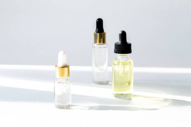 Anti aging serum with collagen and peptides in glass bottles with dropper 