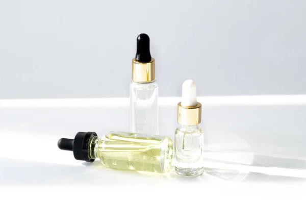 Anti aging serum with collagen and peptides in glass bottles with dropper 