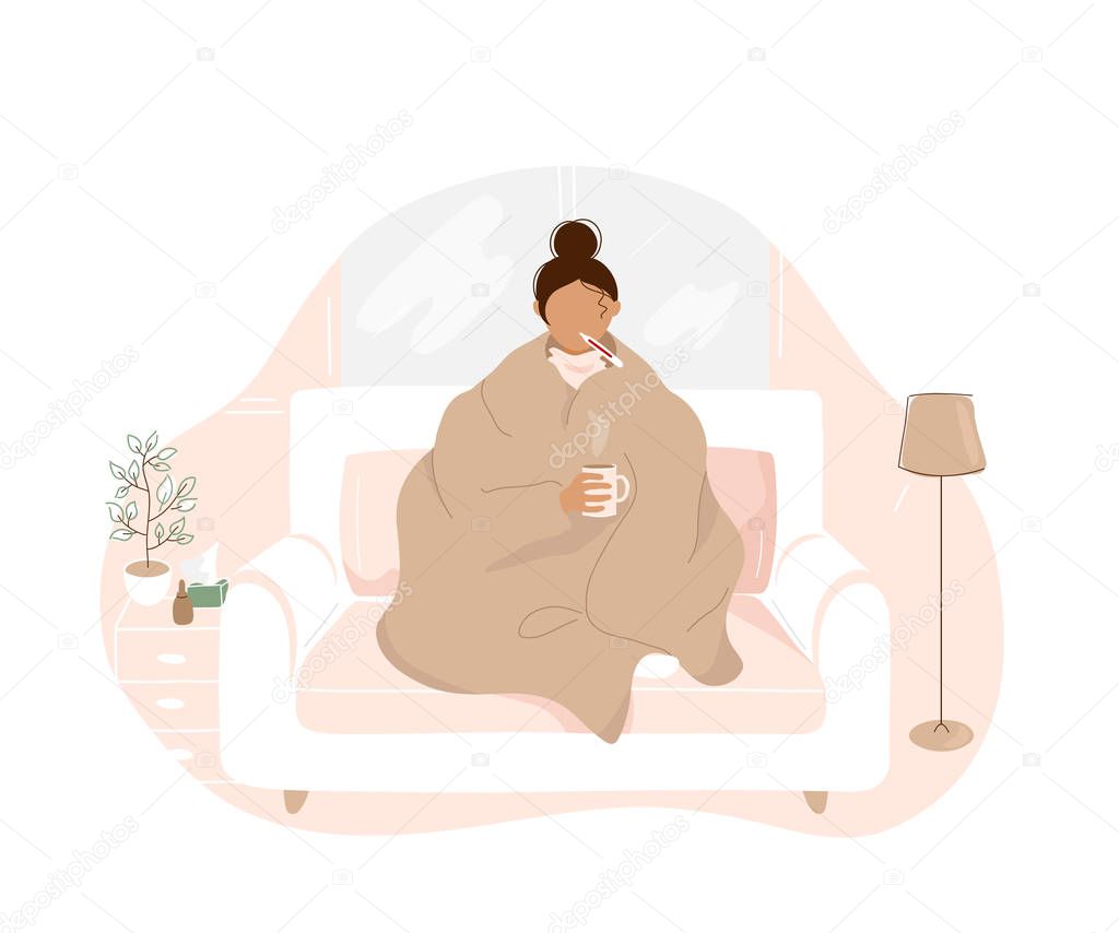 Sick woman with flu sitting on sofa