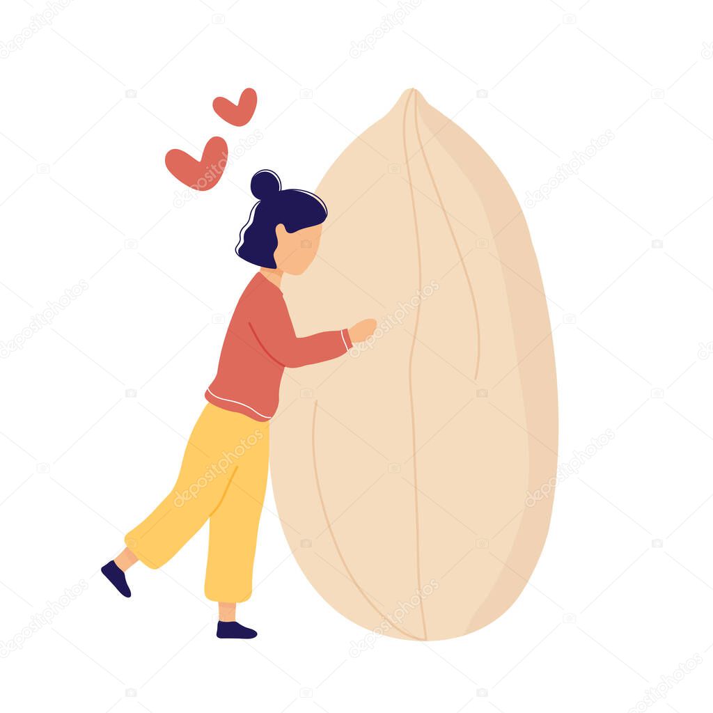 Girl hugging huge peeled peanut with hearts above