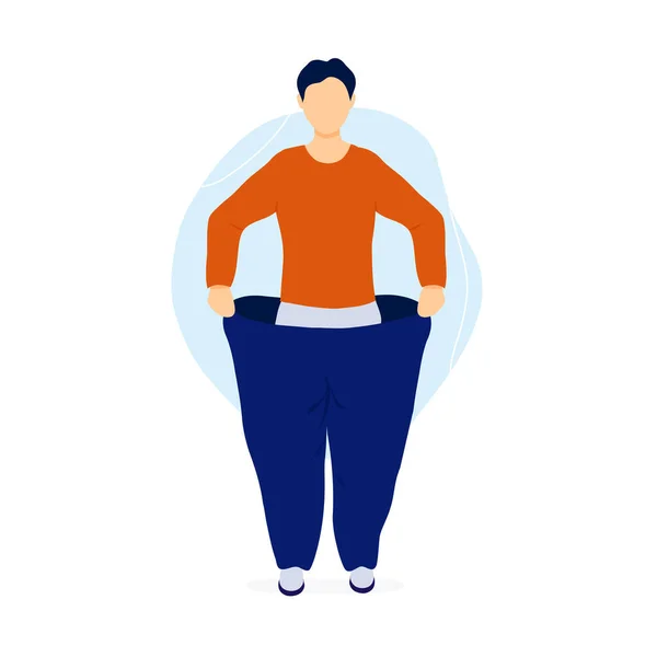 Slim man pulling his oversized pants