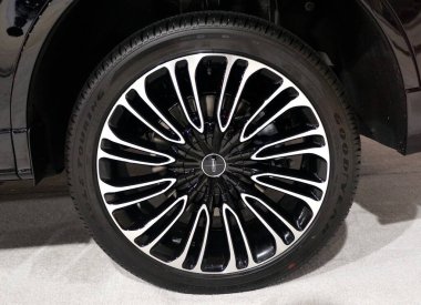 Philadelphia, Pennsylvania, U.S.A - February 10, 2020 - The alloy wheel and tire of 2020 Lincoln Aviator midsize three-row SUV clipart
