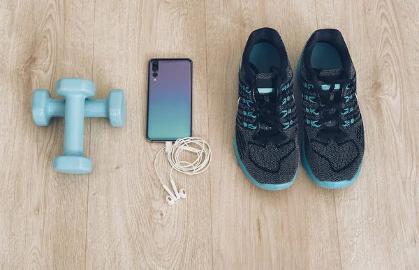 Runner Sneakers Cool Smartphone Ear Phones Smal Dumbbells Wood Background — Stock Photo, Image