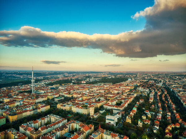 Aerial view around Prague's tv tower at autumn morning with clouds and bright sky