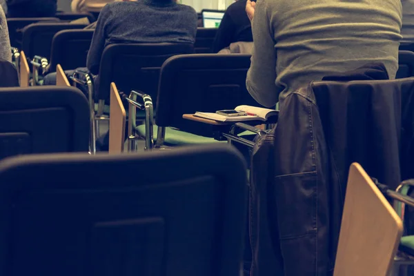 Smart phone on classroom table. — Stock Photo, Image