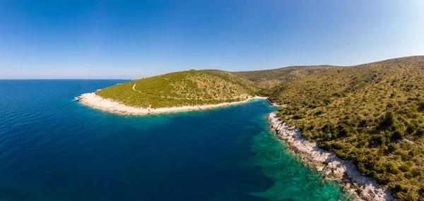 Spectacular aerial sea landscape of rocky coast and crystal clear water. — Stock Photo, Image