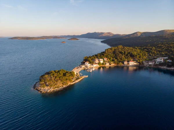 Spectacular aerial landscape with fishing village near peninsula stretching into the sea. — Stock Photo, Image