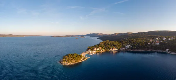 Spectacular aerial landscape with fishing village near peninsula stretching into the sea. — Stock Photo, Image