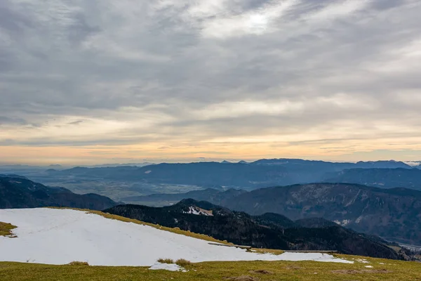 Mountain view from late snow covered ridge. — Stock Photo, Image
