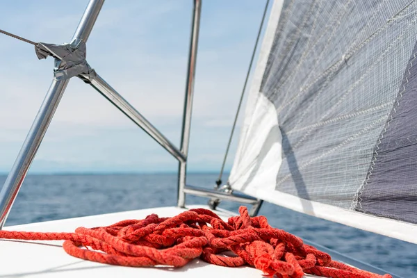 Sailboat deck with stacked red rope while sailing. — 스톡 사진