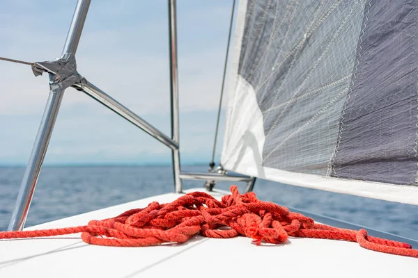 Sailboat deck with stacked red rope while sailing. — 스톡 사진