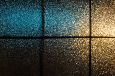 Textured patterned glass on building entrance door