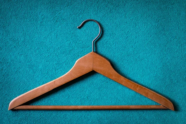 Wooden Clothes Hanger Isolated Blue Carpet Floor — Stock Photo, Image