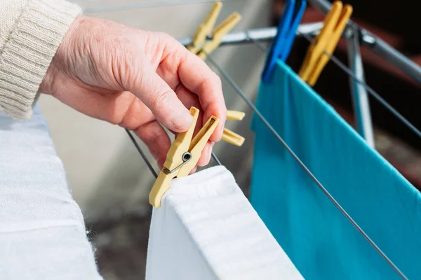 Female Hand Hanging Freshly Washed Laundry Wire — Stock Photo, Image