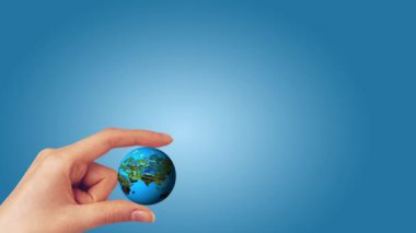 Küresel iş kavramı arka plan dünya parlayan tutan el ile