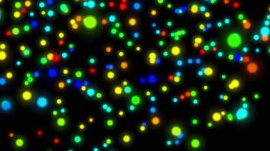 koyu arka plan üzerinde dönen ve uçan renkli ışıklar 