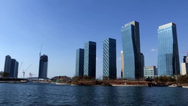 Skyscrapers over river in Korea — Stock Video