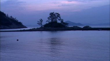 Deniz kıyısı günbatımı, Jangseong-gun,: Jeollanam-do, Korea, doğal görünümünü 