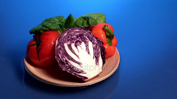 Vegetables on white plate — Stock Video