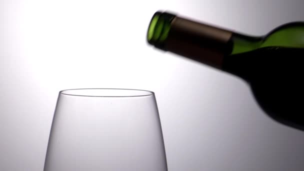 Wine pouring in wineglass — Stock Video